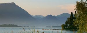 Peaceful landscape of lake and mountains in the background